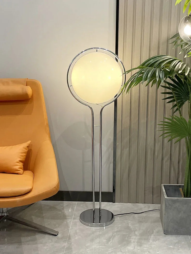 Delord Chrome Floor Lamp — Sculptural Acrylic Globe Light