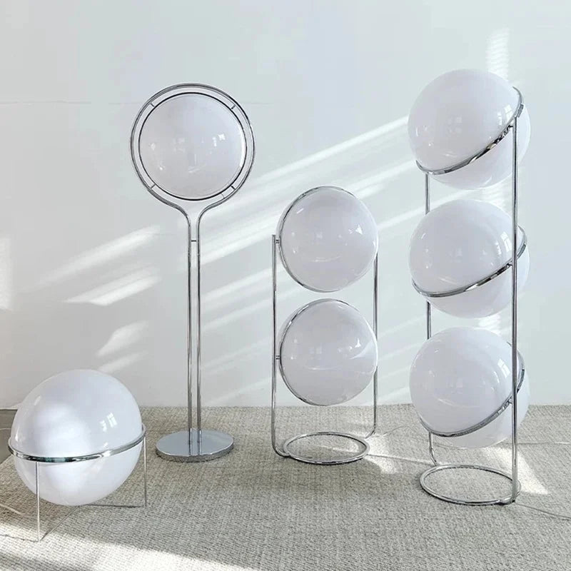 Delord Chrome Floor Lamp — Sculptural Acrylic Globe Light