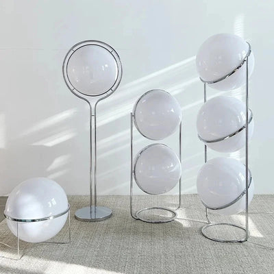 Delord Chrome Floor Lamp — Sculptural Acrylic Globe Light