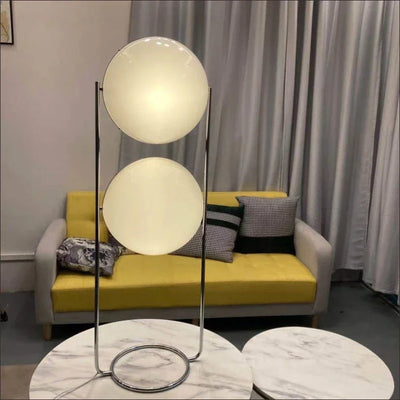 Delord Chrome Floor Lamp — Sculptural Acrylic Globe Light