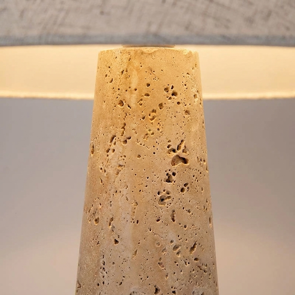 Close-up of the porous yellow travertine lamp base